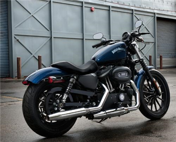 Why do some motorcycles have different front and rear tires?