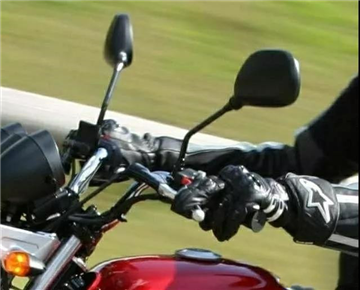 Why is the throttle on the motorcycle designed on the right, not the left?