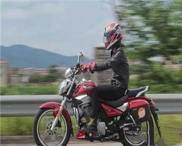 How do you shift gears more smoothly on a motorcycle?
