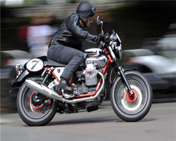 Can the motorcycle be lowered by adjusting the shock absorption?