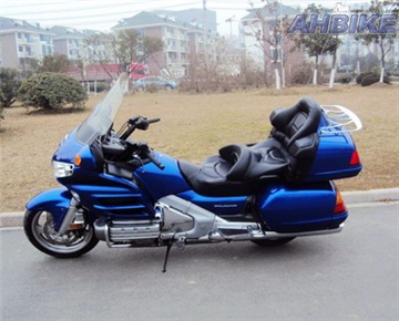 How often is the transmission box of the scooter cleaned?